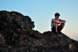Sean on lava rock at Lava Lands (Newberry National Volcanic Monument