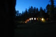 Eleanor's lodge lit at night