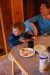 Rhiannon having a snack in the kitchen at HOM
