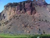 View of Red Wall from the northeast parking lot.  You can see the 5.7 slab climb in the middle