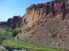View of Red Wall on the right with side view of Picnic Wall and onto Shiprock with the river snaking around